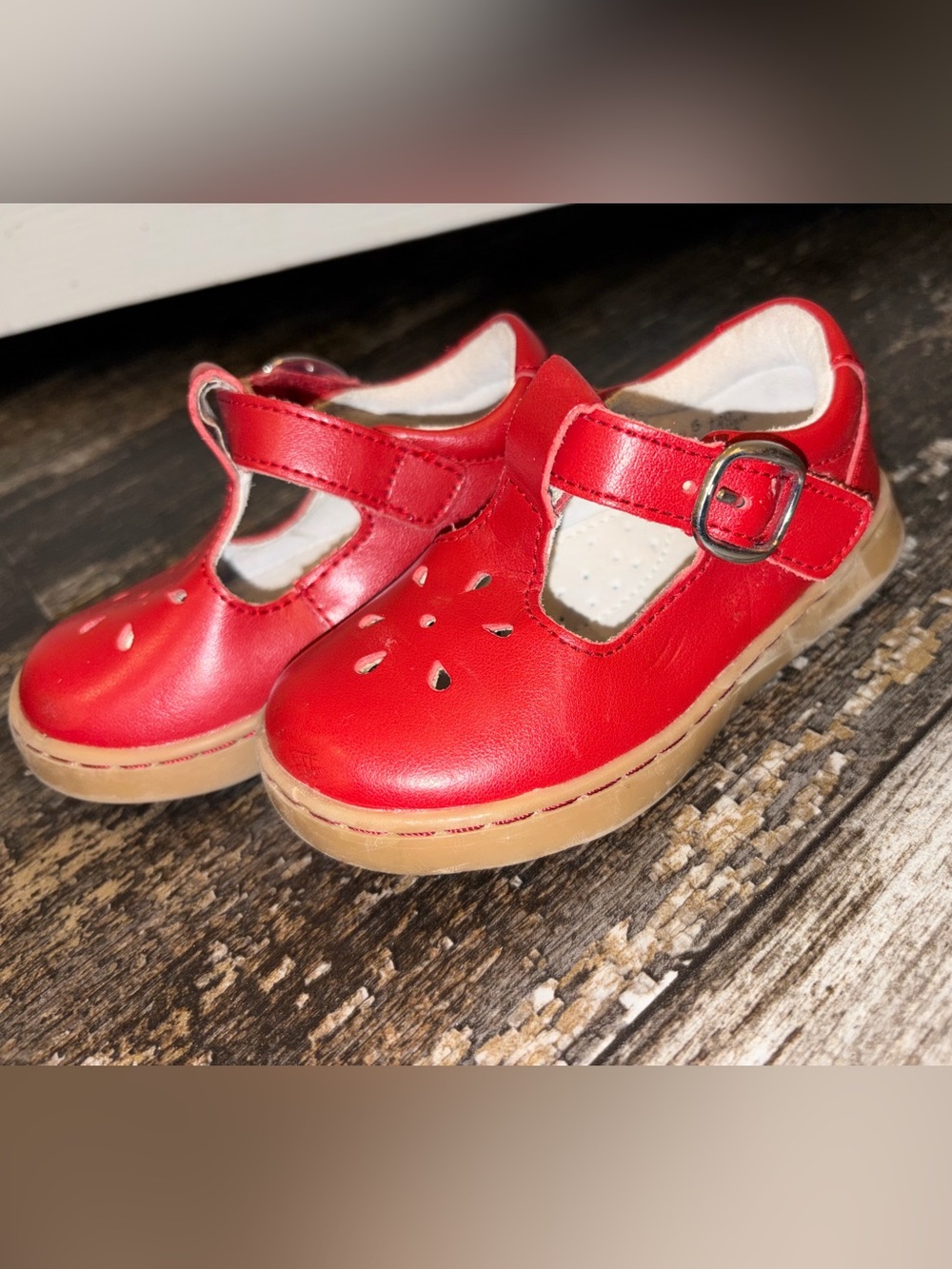 RED L'Amour leather T-strap Mary Jane feature a cutout design adjustable ankle